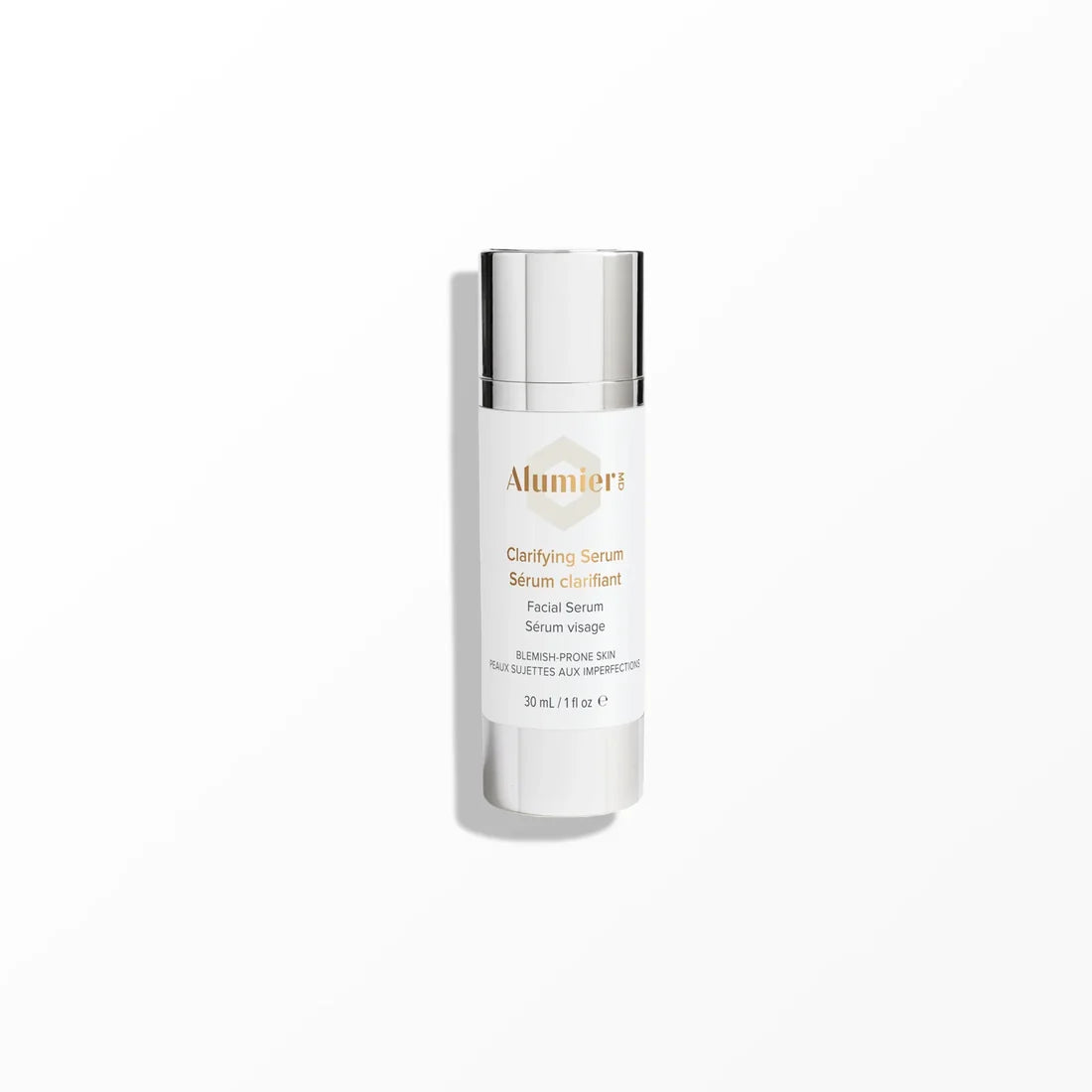 AlumierMD Clarifying Serum white bottle with a silver cap and base on a white background.