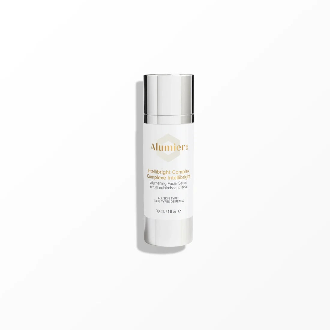 AlumierMD IntelliBright Complex white bottle with a silver cap and base on a white background.