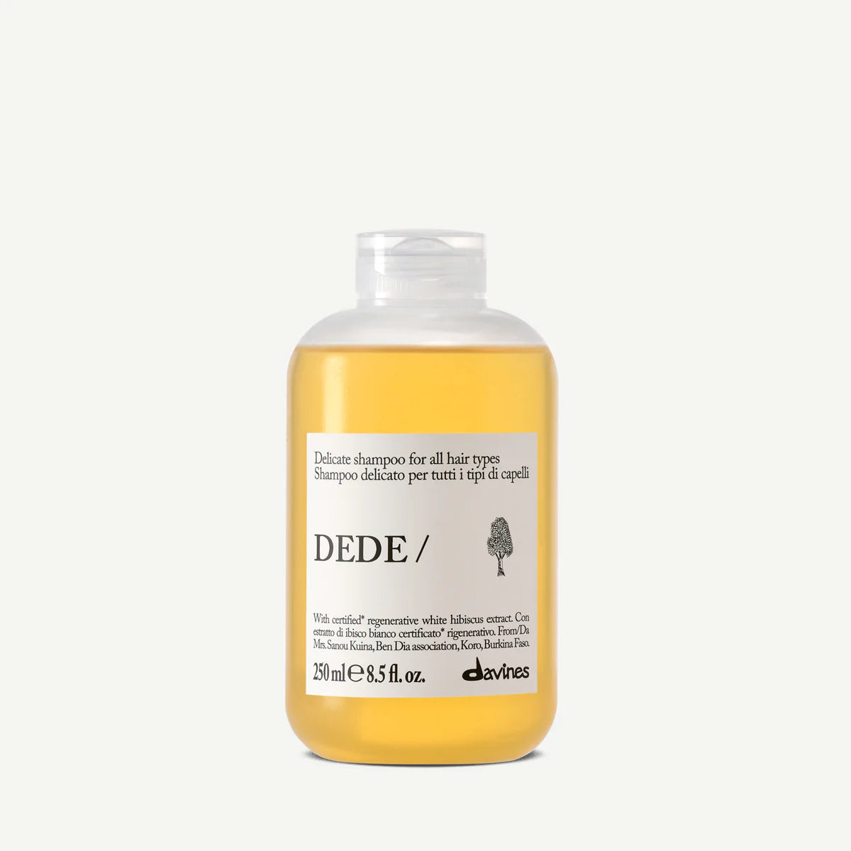 Shampoo bottle with 'DEDE' label on a white background