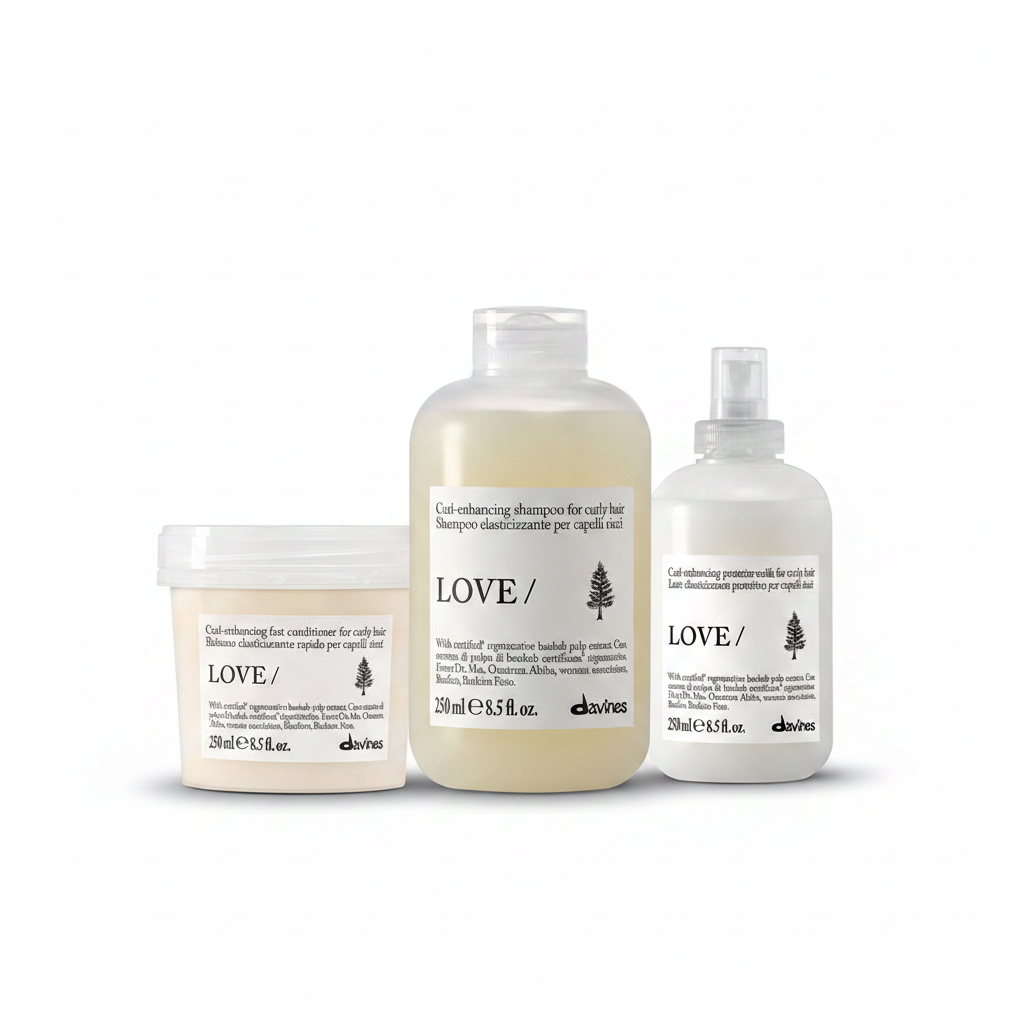 Three DHC Love hair care products on a white background: a jar of conditioner, a large bottle of shampoo, and a pump bottle of scalp cleansing treatment.