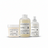 Thumbnail for Three DHC Love hair care products on a white background: a jar of conditioner, a large bottle of shampoo, and a pump bottle of scalp cleansing treatment.