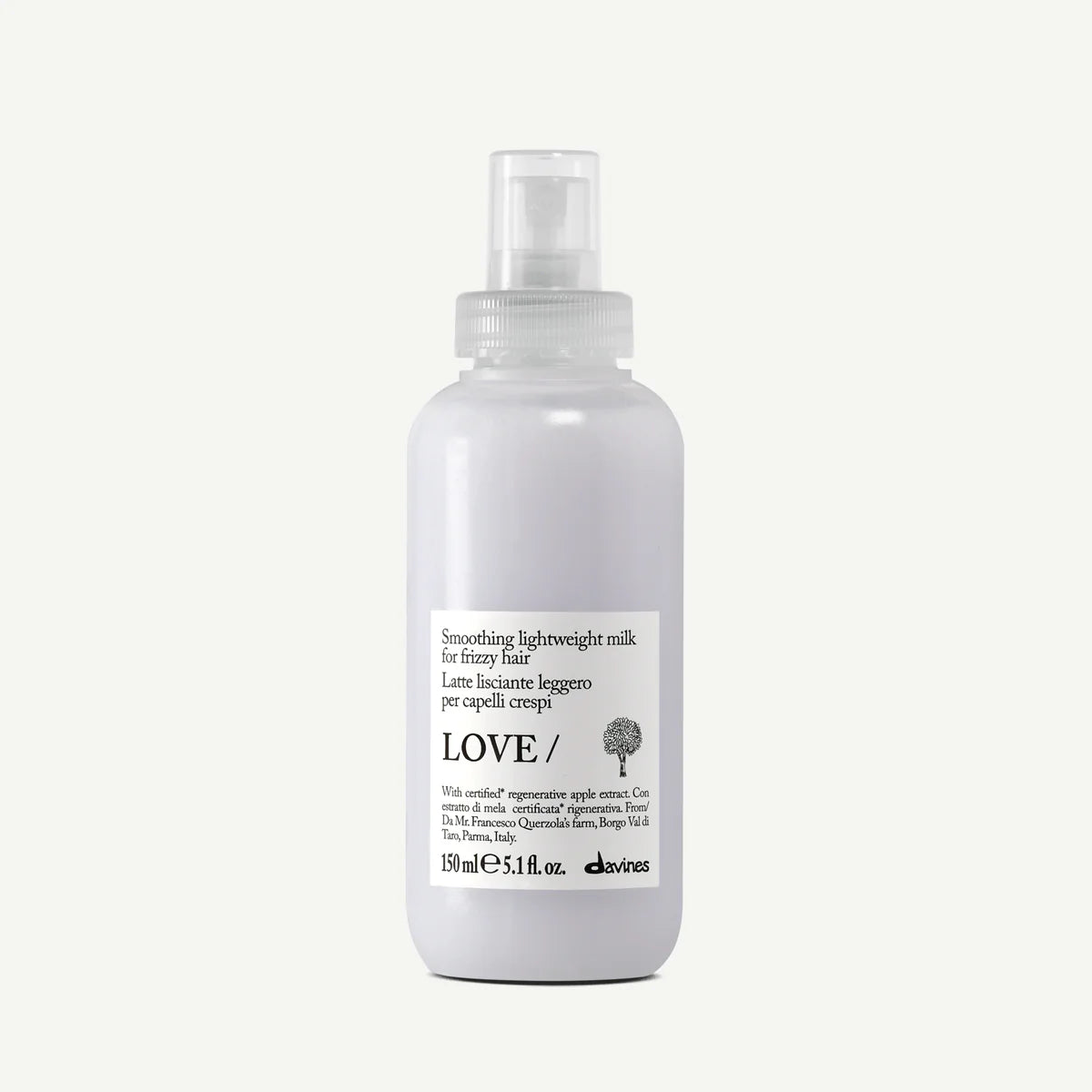 White bottle of Davines hair product on a white background