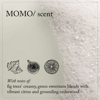 Thumbnail for Product packaging with 'MOMO/' branding and sensory description of fig, citrus, and cedarwood.