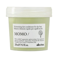 Thumbnail for Davines MOMO Moisturizing Fast Conditioner in a translucent light green plastic tub with a white lid and white label.