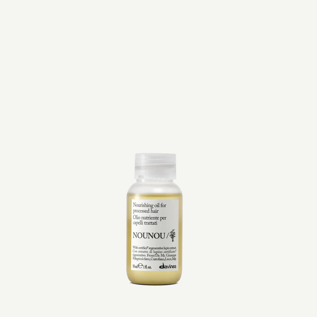 Bottle of NOUNOU hair oil on a white background