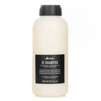 Thumbnail for A 1000 ml bottle of Devines Oi Shampoo with a black cap and a black label, shown on a plain white background.
