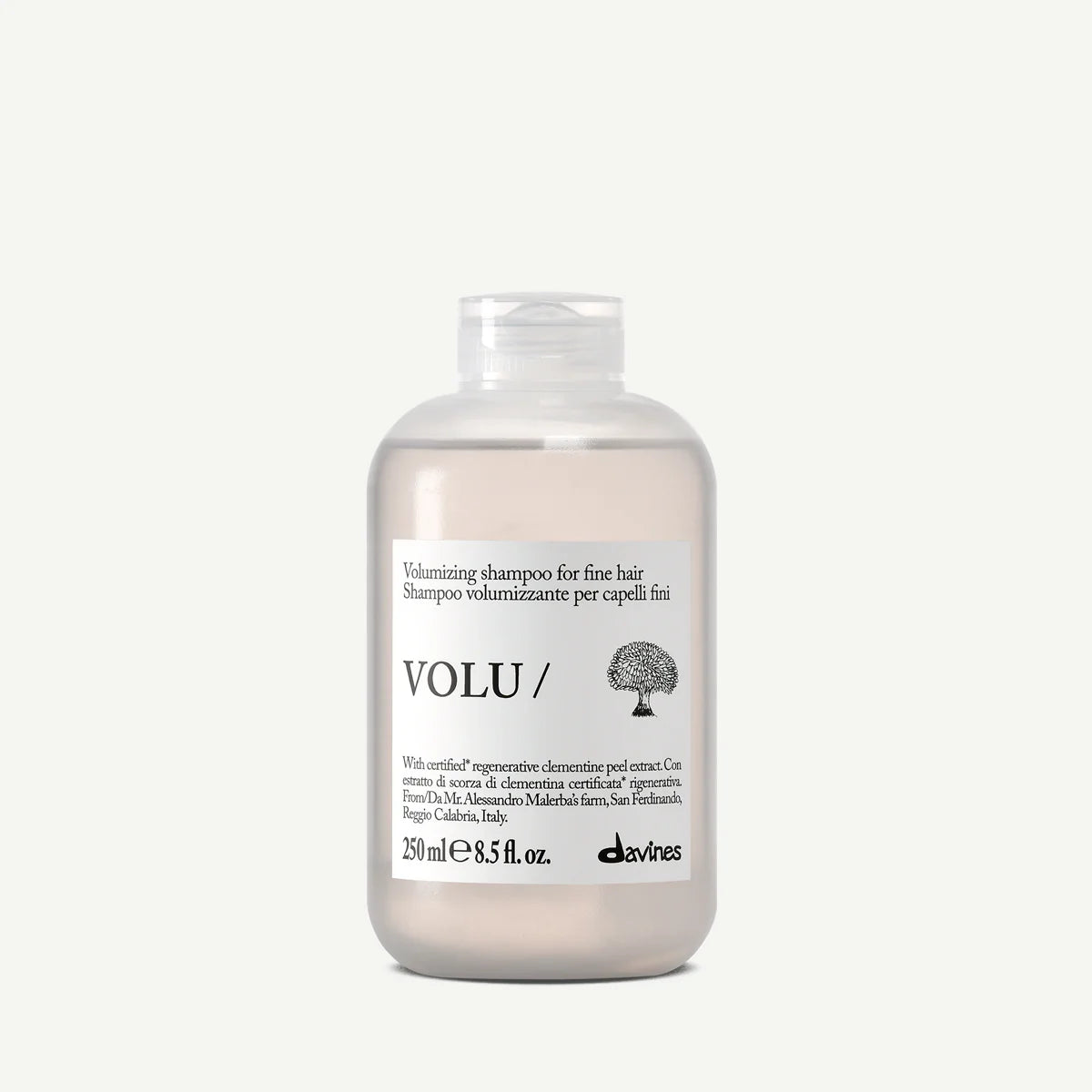 Shampoo bottle with 'VOLU/' label on a white background