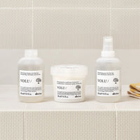 Thumbnail for Three hair care products from the brand 'Volu' on a bathroom shelf.