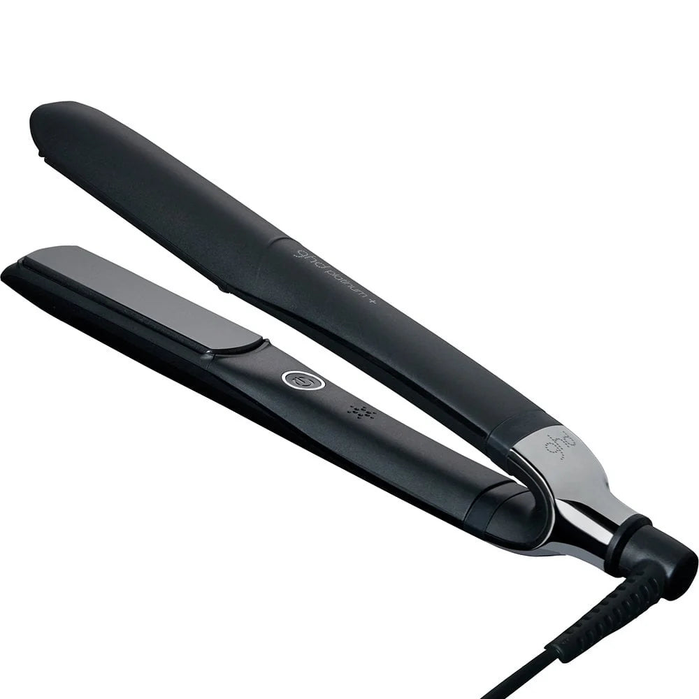 Black hair straightener on a white background