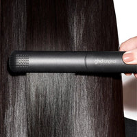 Thumbnail for Person using a ghd hair straightener on dark hair