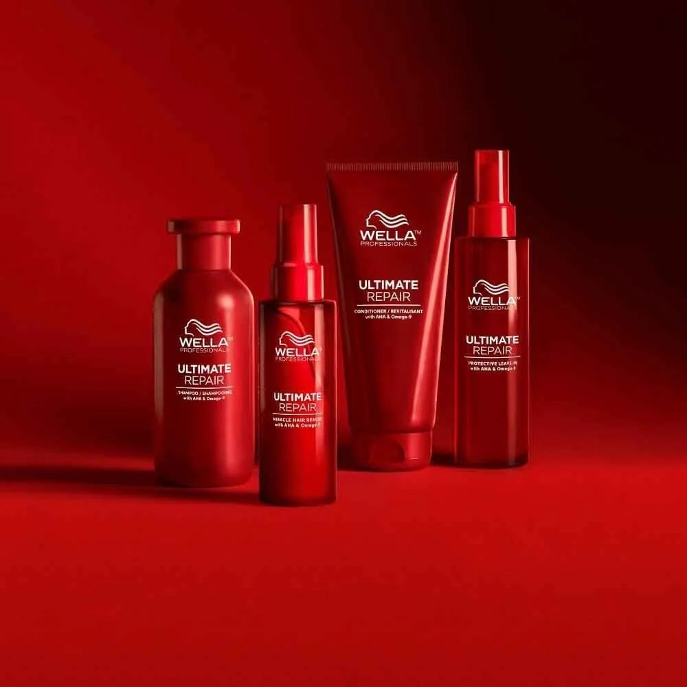 Wella Ultimate Repair hair care products on a red background