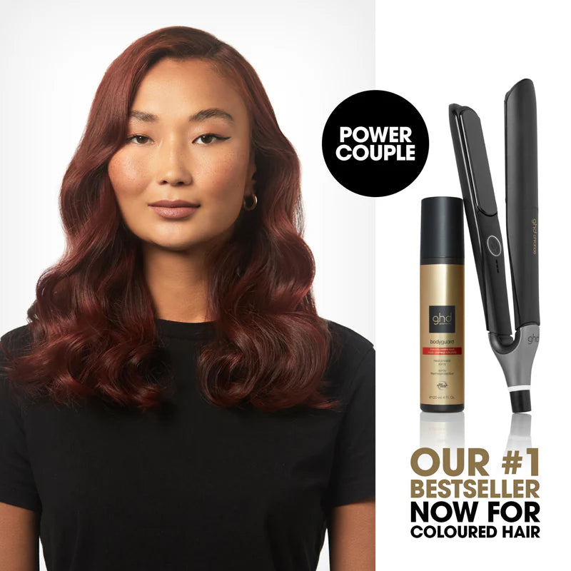 Woman with red hair next to a hair straightener and bottle, with 'Power Couple' branding.