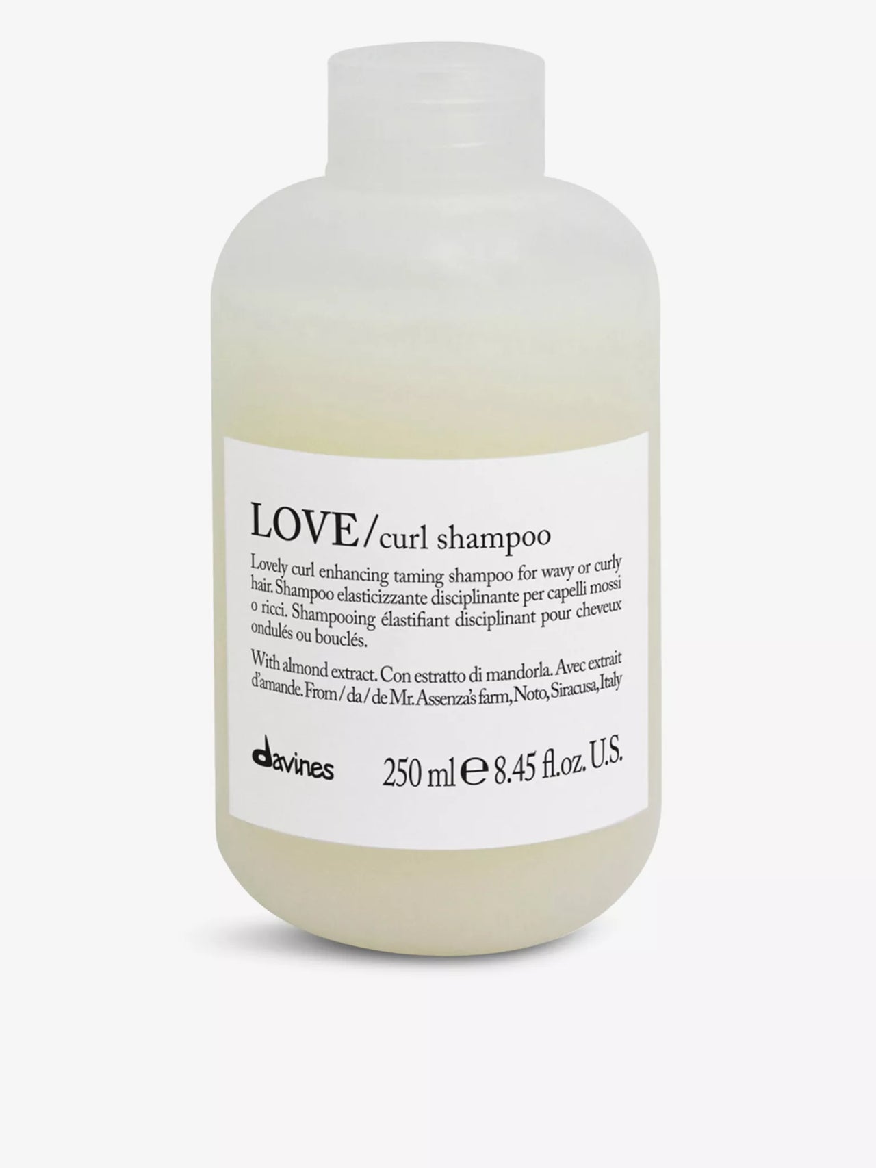 Shampoo bottle labeled 'LOVE/curl' on a white background