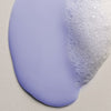 Thumbnail for Close-up of a purple gel-like substance with bubbles on a gray background