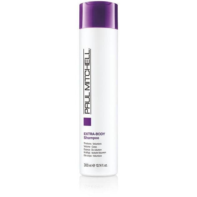 A bottle of Paul Mitchell Extra-Body Shampoo with a white and purple label, indicating it is a volumizing hair product.