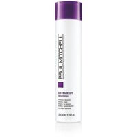 Thumbnail for A bottle of Paul Mitchell Extra-Body Shampoo with a white and purple label, indicating it is a volumizing hair product.