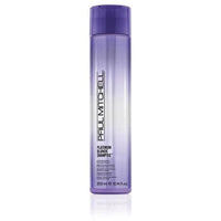 Thumbnail for A bottle of Paul Mitchell Platinum Blonde Shampoo with purple and white labeling, indicating it is designed for blonde, grey, or white hair.